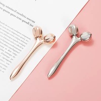 Rouleau de glace en métal doré Rouleau en acier inoxydable Crème glacée Soins de la peau Produits de massage Rouleau de massage facial anti-cellulite