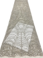 Tissu en dentelle de luxe brodé de fleurs, perlé et à sequins, avec de riches applications de perles, 100% polyester
