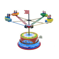 Carrousel vintage en forme de vaisseau spatial à remonter, jouet en métal classique, décoration de bureau, jouet rotatif en métal, cadeau pour enfants, objet de collection rétro, décoration de table