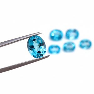 พลอยโทแพซสีฟ้าธรรมชาติ ขนาด 8x10 มม. รูปทรงวงรี เจียระไนแบบเหลี่ยม คุณภาพระดับ AAA หรูหรา ได้รับการรับรองจากผู้ตรวจสอบอิสระ สำหรับทำเครื่องประดับ - Product Image 1