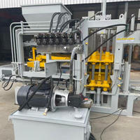Machine de fabrication de blocs de béton haute performance QT4-15 entièrement automatique et efficace, machine hydraulique automatique QT4-15 pour blocs creux en ciment