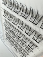 Vente en gros Emballage personnalisé Cheveux synthétiques duveteux bouclés doublement cryptés Faux cils sans colle Paires de couleurs naturelles