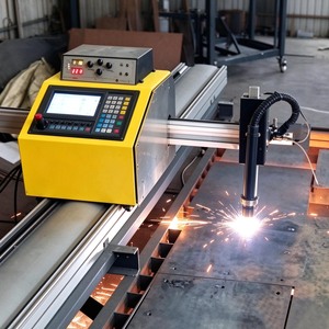 Machine de découpe plasma CNC portable à double torche plasma et flamme pour la découpe de plaques en acier au carbone de chaudières, certifiée CE - Product Image 1