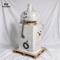 Machine automatique de division et de façonnage de pâte pour boulangerie, avec dispositif de sécurité d'arrêt d'urgence