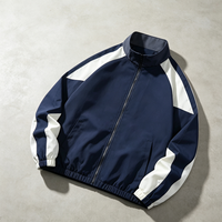 Blouson Bomber Homme Col Montant Patchwork Color Block Manches Raglan Imperméable Coupe-Vent Zippé Vêtement d'extérieur Décontracté Sportif Ample