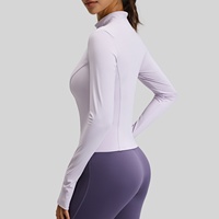 Veste de yoga respirante et tendance pour femme, idéale pour la course à pied, le cyclisme et le sport, coupe ajustée, élastique, avec logo frontal.
