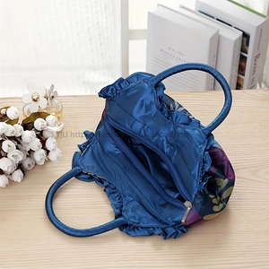 Sac à main coréen tendance pour femme, sac de maman, pochette pour téléphone portable et clés, avec fermeture éclair en dentelle de couleur unie, en polyester Tanjing - Product Image 2