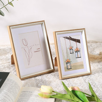 Nueva llegada regalos de estilo europeo de escritorio minimalista decoración del hogar cuadro de mesa hueco foto Marco de resina