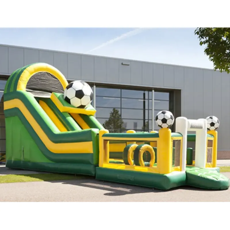 Green and yellow inflatable soccer slide with bouncer.