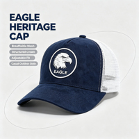 Casquette de camionneur ajustable en daim bleu marine avec patch circulaire en caoutchouc Aigle et calotte structurée en maille blanche, idéale pour la chasse, la pêche et les activités de plein air