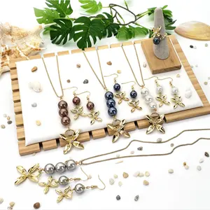 Set Perhiasan Kalung Mutiara Hawaii Set Anting-Anting Kalung Liontin Semanggi Empat Daun untuk Perhiasan Pernikahan