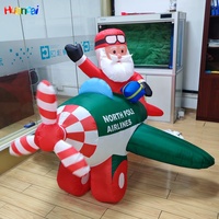 Hélicoptère de Noël gonflable éclairé avec Père Noël gonflable sur avion Décoration de fête de Noël parfaite