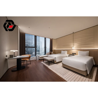Suite de chambre d'hôtel complète sur mesure avec lit, armoire et fenêtre pleine hauteur, style moderne 5 étoiles, fabriquée directement par le fabricant de Foshan
