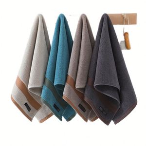 Serviette de bain en tissu éponge bio avec logo personnalisé, 100% coton tissé, absorbante, pour le lavage du visage, le sport, l'hôtel, la maison, le spa - Product Image 1