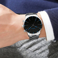 Ensemble Montre Homme Bestseller avec Bracelet en Alliage, Verre, Affichage Analogique à Quartz, Cadran 42mm, Collier et Bague pour Homme