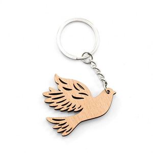 Llavero de madera con diseño de paloma, llaveros de animales voladores, llavero de bienvenida de madera, personalizado con láser, en bolsa OPP, diseño personalizado - Product Image 1