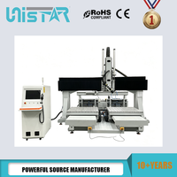Centre d'usinage CNC 5 axes à double table haute efficacité pour le travail du bois, la gravure de moules en bois et en mousse 3D