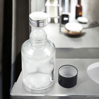 Flacon diffuseur en verre transparent de luxe personnalisé avec bouchon à vis noir imprimé à l'écran pour huiles essentielles