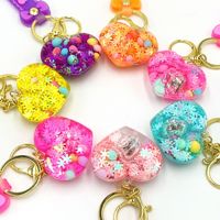 Porte-clés décoratif en acrylique, motif dessin animé mignon, avec perles bulles colorées et bouteille à sable mouvant à l'huile