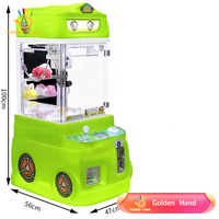 Machine à griffes à main dorée Mini pompier en peluche Machine à poupée pour centre d'amusement