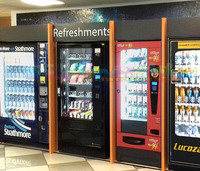 Distributeur automatique de boissons et de snacks avec système de refroidissement à grande capacité