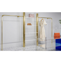 Porte-vêtements mural personnalisé avec logo, en acier inoxydable, pour boutique de vêtements pour enfants, présentoir de robes pour femmes, présentoir professionnel