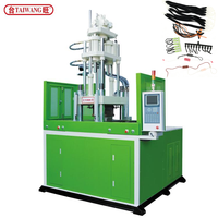 Machine de moulage par injection à table coulissante verticale hydraulique contrôlée par PLC TAIWANG pour la fabrication de fermetures éclair en PP/PVC/PA/PE/PC
