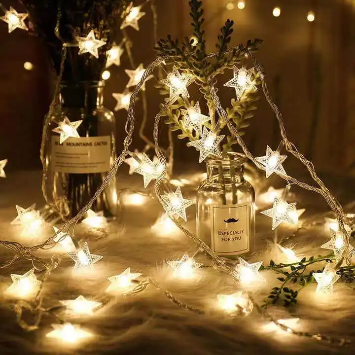 سلسلة نجوم من المصابيح بطول 10 أقدام و20 مصباح LED يعمل بالبطارية تصلح لحفلات غرف النوم وحفلات الزفاف وزينة شجرة الكريسماس (أبيض دافئ)