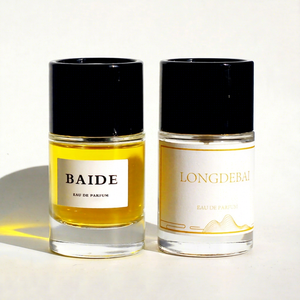 Flacon de parfum en verre de luxe personnalisé, transparent, rond, avec pompe à pression, 50 ml, 100 ml, avec boîte - Product Image 1