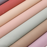 Venta al por mayor de papel de regalo de flores en relieve impermeable para flores de color sólido papel de regalo coreano ramo
