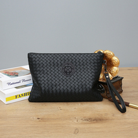 Pochette tendance en cuir tressé noir avec motif tête de tigre unique pour homme – Sac à main pour homme avant-gardiste