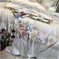 Nouvel ensemble de literie de luxe en coton égyptien brodé de fleurs, 4 pièces, housse de couette douce, drap plat avec deux taies d'oreiller