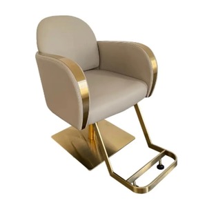 Fauteuil de salon de coiffure de luxe en cuir synthétique beige, structure dorée, pivotant à 360 degrés, en acier, design ergonomique, pour usage en ba - Product Image 1