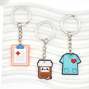 Venta al por mayor de silicona suave PVC goma llavero lindo medicina dibujos animados llavero médico enfermera semana regalo llaveros