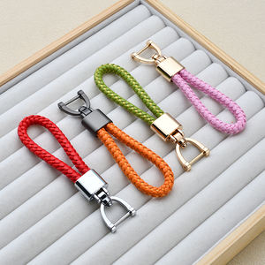 Porte-clés créatif en cuir tressé, porte-clés de voiture transfrontalier en métal, pendentif de sac à fermoir mors, petit cadeau personnalisé - Product Image 2