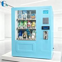 Petit distributeur de collations et de boissons personnalisable avec options de paiement en espèces