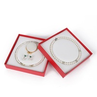 Boîte cadeau pour collier nœud papillon en perles avec logo, personnalisable en usine, forme carrée, motif circulaire, emballage de bijoux tendance avec pendentif en perles