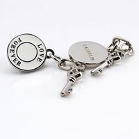 Fabrication de porte-clés en métal sur mesure, porte-clés et porte-monnaie en forme de clé plaqués argent pour cadeaux d'affaires et promotion