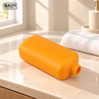 Bouteille orange de 700 ml, emballage pour soins personnels, forme moderne, bouteille à pompe en PE, épaisseur personnalisée, étiquetage pour gel douche