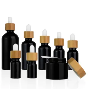 Embalagem cosmética 2022, embalagem completa de 5ml, 10ml, 15m, 20ml, 30ml, 50ml, 100ml, vidro preto, garrafa de óleo de barba, com gotejador de bambu