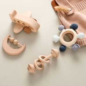 Cadeau de <span class=keywords><strong>naissance</strong></span> pour bébé puzzle multifonctionnel jouets d'éducation précoce hochets rongeant gomme de dentition billes de bois <span class=keywords><strong>ensemble</strong></span> de jouets d'avion - Product Image 1
