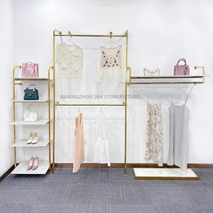 Penjualan terlaris rak pakaian butik emas rak gantungan logam terpasang di dinding rak baju untuk toko ritel - Product Image 1