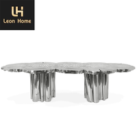 Mobilier de maison sur mesure table de banquet au design unique grande table à manger de luxe moderne italienne en acier inoxydable à la feuille d'argent