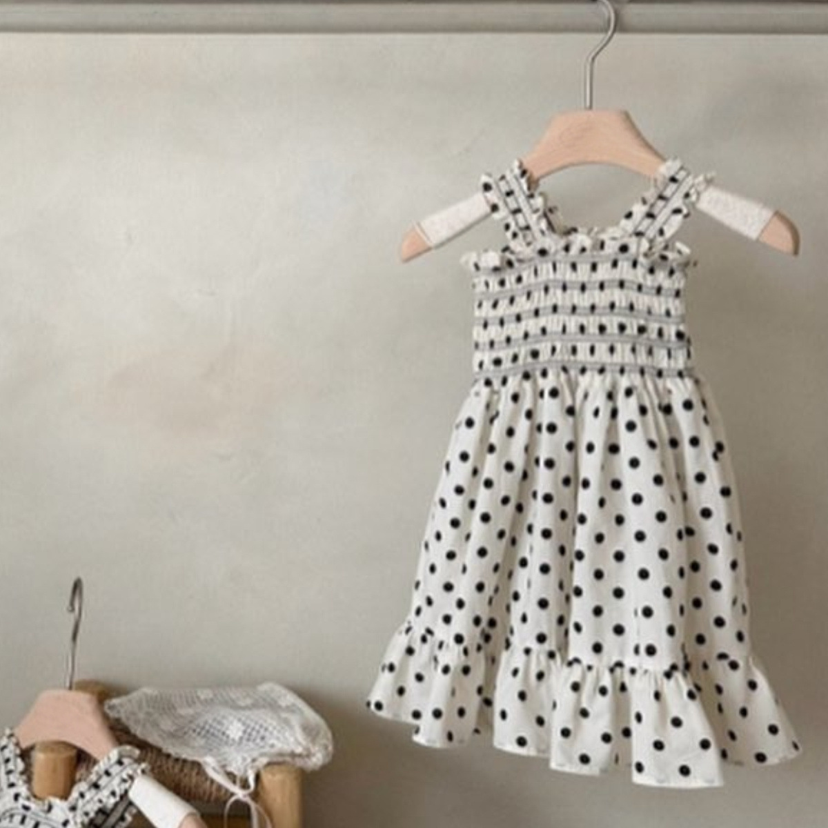 Black polka dot slip dress