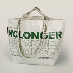 Hand Woven Bag Custom Laminated Plastic Advertising Large Capacity Gift Bag Clothing Shopping Woven Tote Bag in Stock - Product Image 1