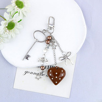Vente en gros Y2K arc amour coeur sac breloque porte-clés accessoires élégant tendance nœud papillon étoile téléphone chaîne sac à dos pendentif porte-clés