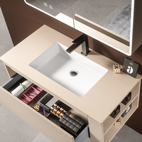 Meuble-lavabo mural flottant minimaliste sans poignées avec miroir LED et système de fermeture douce
