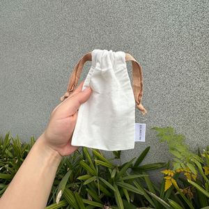Factory Sale Wholesale Recycled Cotton Jewelry Dust Bag Cotton <b>Drawstring</b> Bag <b>Pouches</b> With Label - Product Image 3