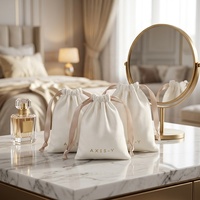 Sac cadeau de luxe avec cordon de serrage et ruban, sacs cadeaux promotionnels