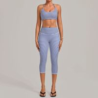 Ensemble de fitness 2 pièces pour femme à pois, color-block, avec soutien-gorge de sport dos nu et legging capri à séchage rapide pour l'entraînement